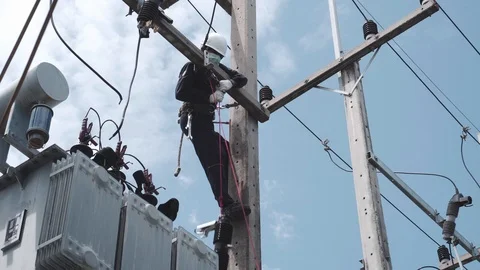 Electrical engineering is working on high voltage. Stock Footage 117994474