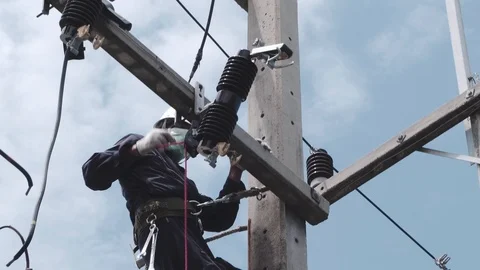 Electrical engineering is working on high voltage. Stock Footage 117994604