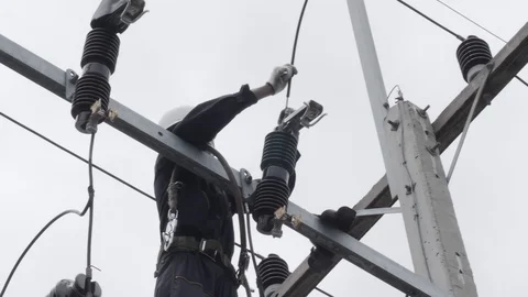 Electrical engineering is working on high voltage. Stock Footage 117994606