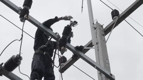 Electrical engineering is working on high voltage. Video stock 118238379