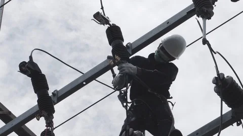 Electrical engineering is working on high voltage. Video stock 118761944