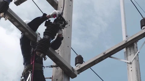 Electrical engineering is working on high voltage. Stock Footage 118970565