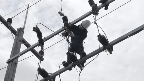 Electrical engineering is working on high voltage. Stock Footage 119854783