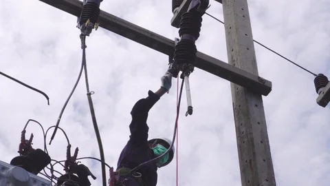 Electrical engineering is working on high voltage. Stock Footage 119854786