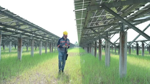 Electrical engineers are inspecting and maintaining solar cells Stock Footage 255260470