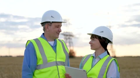 Electrical engineers portrait smile. close-up engineer face against background Stock Footage 247553884