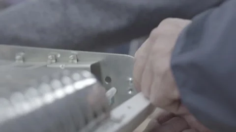 Electrical equipment repair. The technician disassembles the device Stock Footage 264040170