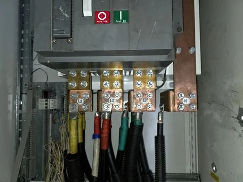 Electrical Equipment Setup in Cabinet With Multiple Connections Visible Insid Stock Photos