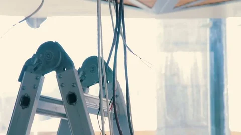 Electrical exposed wires dangling from the ceiling Stock Footage 83846594