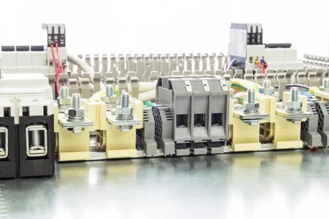Electrical feedthrough terminals, cables and wires on the artboard. Foto stock