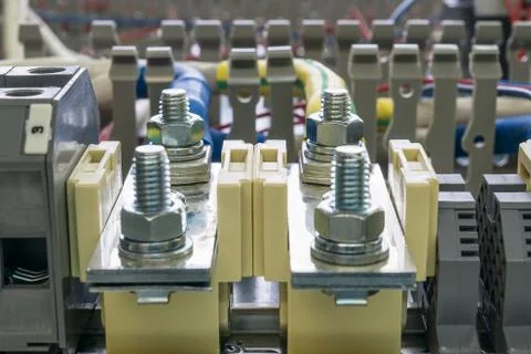 Electrical feedthrough terminals, cables and wires on the artboard. Foto stock