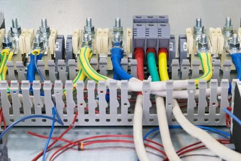 Electrical feedthrough terminals, cables and wires on the artboard. Stock-Fotos
