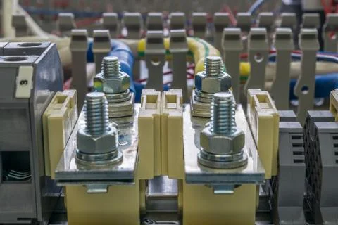 Electrical feedthrough terminals, cables and wires on the artboard. Stock Photos