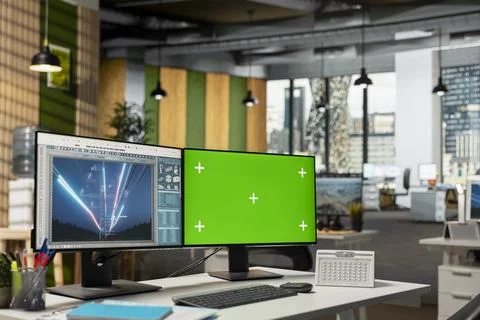 Electrical grid data on isolated screen PC in empty office Stock Photos