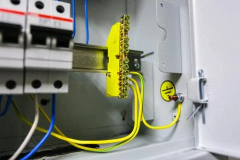 Electrical ground wires is connected to ground copper bar or earth bonding bar Stock Photos