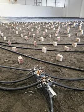 Electrical installation groundwork for industrial construction site Stock Photos