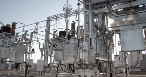 Electrical insulators and cables in power station, industrial energy concept Video stock 329100762
