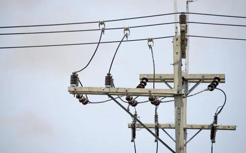 Electrical insulators set, cable laying work. Transmission lines. Stock Photos