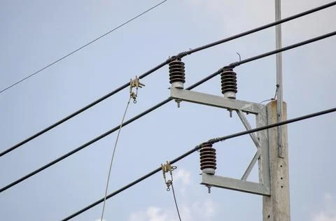 Electrical insulators set, cable laying work. Transmission lines. Stock Photos