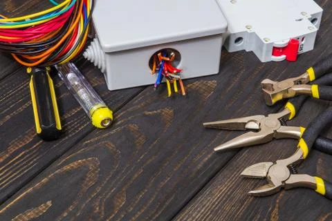 Electrical junction box with cables wire and tools used in the electric insta Stock Photos