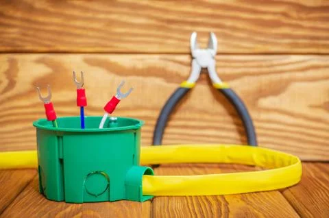 Electrical junction green box with cable wire used in the electric installati Stock Photos