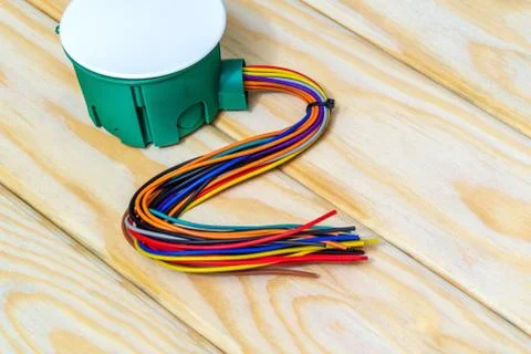 Electrical junction green box with wires usually used in the electric install Stock Photos