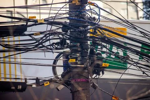 Electrical lines on pole as seen on streets of Sao Paulo Stock Photos