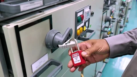 Electrical lockout system applied before maintenance work highlights safe work p Stock Footage 335966775