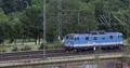 Electrical Locomotive Passing on Elevated Tracks Arriving in Dresden City Day 4k or 4k+ Resolution