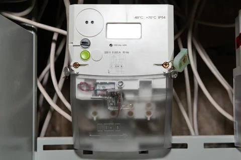 Electrical meter with electrical power cables Stock Photos