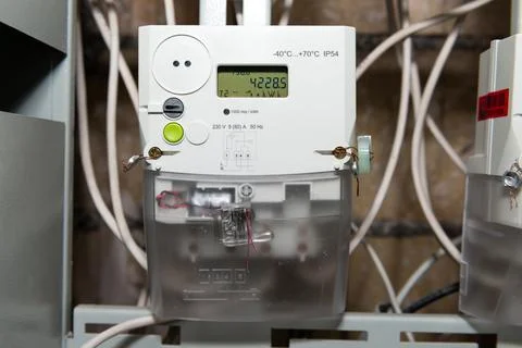 Electrical meter with electrical power cables Stock Photos