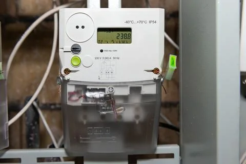 Electrical meter with electrical power cables Stock Photos