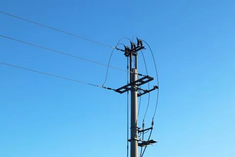 Electrical network of high voltage. Transportation of electricity through the Stock Photos