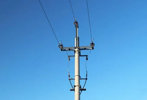 Electrical network of high voltage. Transportation of electricity through the Stock Photos