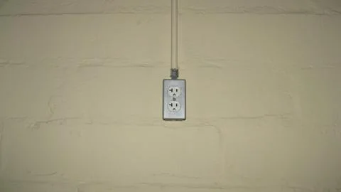 Electrical Outlet On Basement Wall Stockfoto's