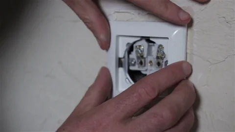 Electrical Outlet Cover Being Installed Stock Footage