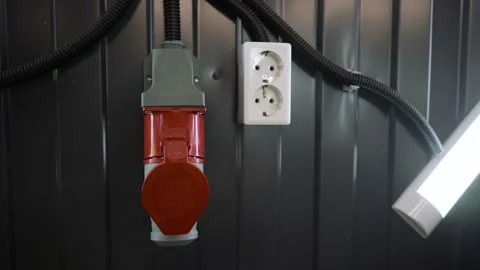 Electrical outlet in production close-up. Electrical wires. Safety Concept Stock Footage 155790285