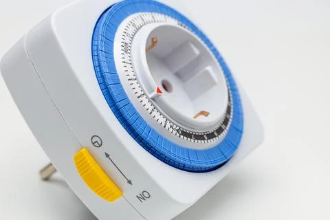 Electrical outlet with timer, mechanical timer on the outlet Stock Photos