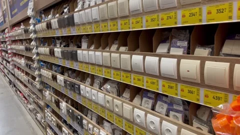 Electrical outlets and switches in a hardware store Stock Footage 242625848