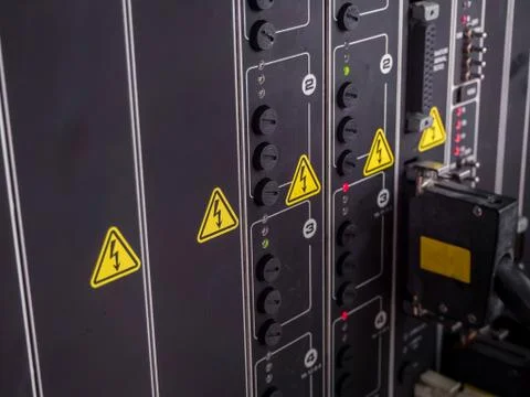 Electrical panel at a assembly line factory. Controls and switches. Stock Photos