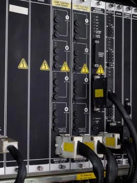 Electrical panel at a assembly line factory. Controls and switches. Stock Photos