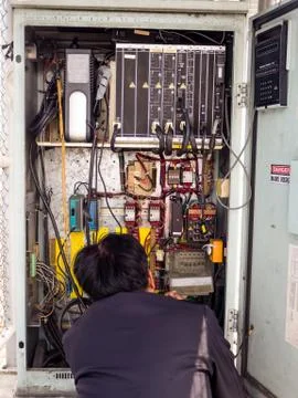 Electrical panel at a assembly line factory. Controls and switches. Stock Photos