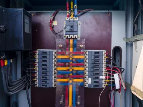 Electrical panel at a assembly line factory. Controls and switches. Stock Photos