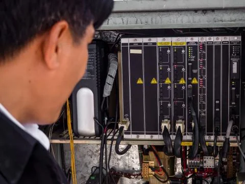 Electrical panel at a assembly line factory. Controls and switches. Stock Photos