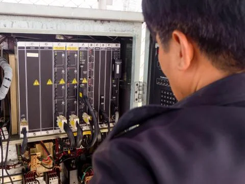 Electrical panel at a assembly line factory. Controls and switches. Foto stock