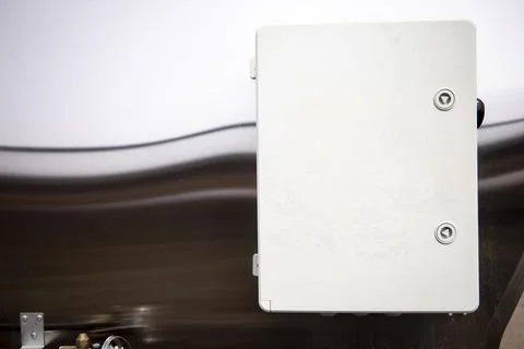 Electrical panel on the barrel for cooling milk. Stock Photos