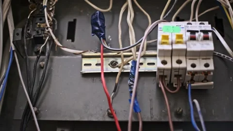 Electrical Panel with Exposed Wires and Circuit Breakers Stock Footage 275590233