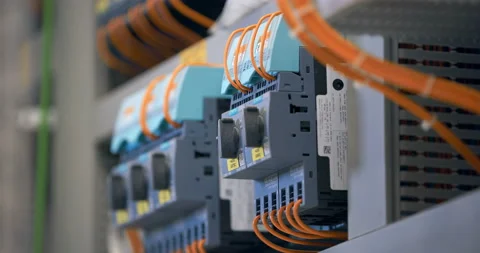 Electrical panel with many wires, electrical parts, automatic switches, fuses Stock Footage 147634435