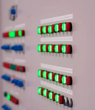 Electrical panel with red and green warning lights Stock Photos