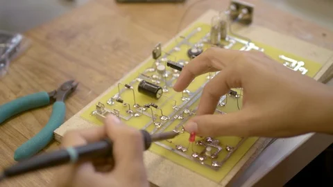 Electrical parts soldering Stock Footage 124477945